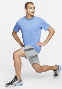 Nike Performance CREW SOLID - T-shirt desportiva - light game royal heather/black