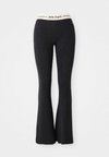 TONE PANTS - Pantalon de survêtement - black/off white