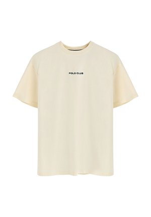 Cream short-sleeve t-shirt, made of soft fabric, featuring a crew neckline and 'POLO CLUB' printed in black across the chest.