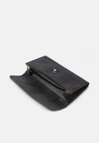 Black leather wallet with zipper closure, a textured exterior, and a snap button. Open, revealing interior pocket and streamlined design.