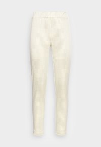 Leggings em padrão de gingham amarelo e branco com cintura elástica. Design slim fit com textura suave e pernas ajustadas.
