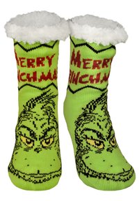 Calze di Natale a tema Grinch verde con polsini bianchi e soffici e il testo rosso "Merry Grinchmas" su ciascuna calza.