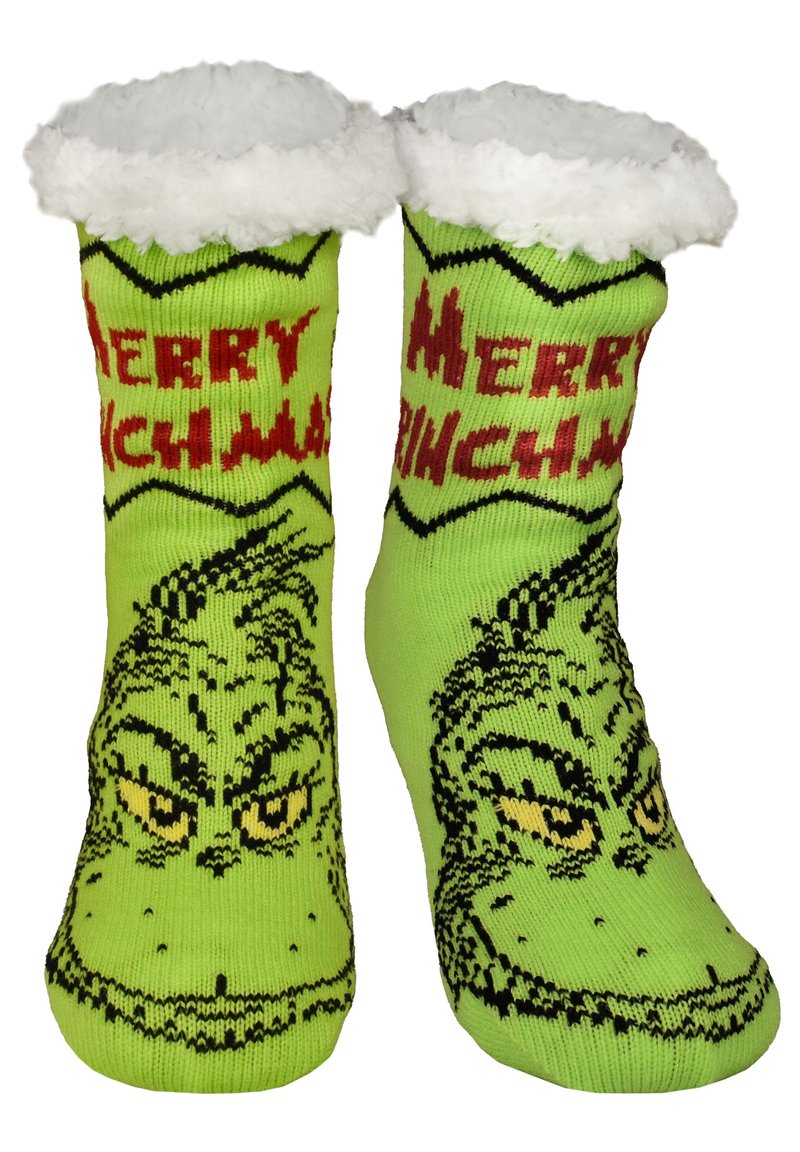 Calze di Natale a tema Grinch verde con polsini bianchi e soffici e il testo rosso "Merry Grinchmas" su ciascuna calza.