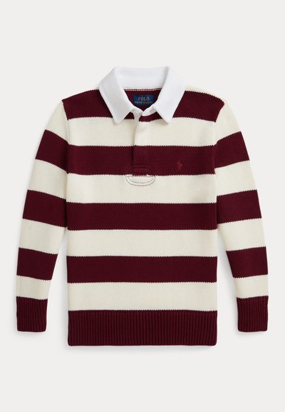 Bordo un balti svītrots polo džemperis ar apkaklīti, garām piedurknēm un ribotām aprocēm. Uz kreisā krūtīm ir mazs logs virs kabatas.