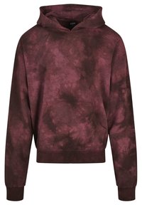 Hanorac cărămiziu cu un model tie-dye, cu glugă cu șnur, buzunar kangaroo și manșete cu nervuri. Fabricat dintr-un material moale, cu o croială lejeră.