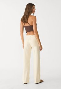 Stradivarius Straight leg jeans - beige