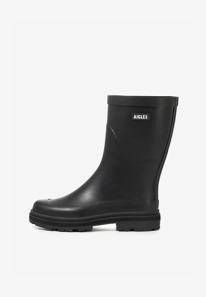 Black rubber rain boot with a smooth finish, round toe, and a low block heel. Features a logo on the outer side and textured sole for grip.