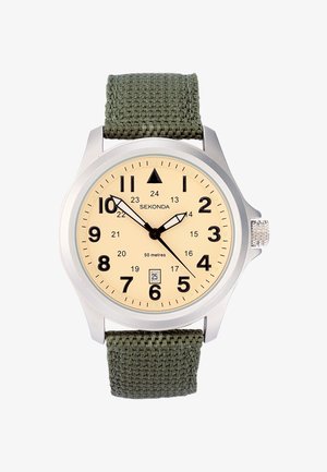 Montre Sekonda avec un boîtier en argent, un cadran crème, des chiffres arabes noirs, un affichage de la date et un bracelet en tissu vert. Résistante à l'eau jusqu'à 50 mètres.