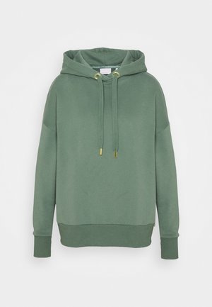 Grön huva hoodie i mjukt tyg. Har en känguruficka, ribbade muddar och guldfärgade metallaccentar på dragskorna.