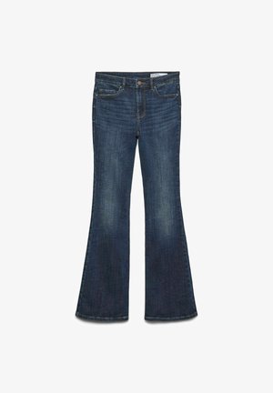 Tumši zili džinsi ar flared piegriezumu, vidēji augstu jostasvietu, piecām kabatām un gaiši izgaismotām vietām gurnos. Izteikta plata kāja apakšmalā.