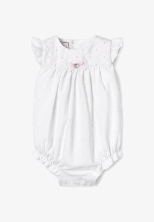 Grenouillère bébé blanche matelassée avec des pois roses brodés, manches à volants, jambes froncées et un petit nœud rose avec un pendentif argenté sur la poitrine.