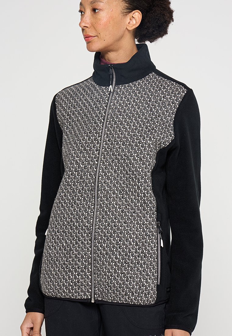Schwarz-graue Zip-Jacke mit strukturiertem gewebtem Frontteil, Fleece-Material, hoch geschnittenem Kragen und seitlichen Taschen. Akzentuiert mit glatten Reißverschlüssen.