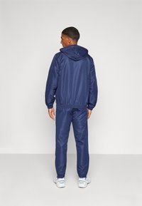Sergio Tacchini CARSON HOODIE TRACKSUIT SET - Treningas - navy