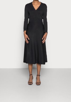 Stickad klänning - black