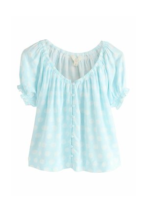 Light blue short-sleeve blouse with white polka dots, round neckline, ruffled sleeves, and a front row of fabric-covered buttons.