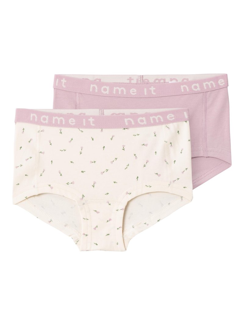Deux paires de sous-vêtements pour enfants : l'une avec une base beige clair et un motif floral, l'autre en violet clair uni, toutes deux avec des ceintures contrastées.