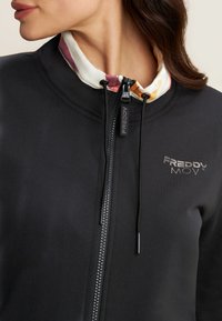Freddy CON DETTAGLI - Sudadera con cremallera - black zebraanimaliermulticolor