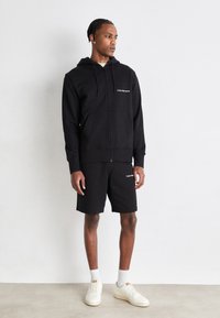 Calvin Klein Jeans INSTITUTIONAL ZIP THROUGH HOODIE - Zip-up sweatshirt - black