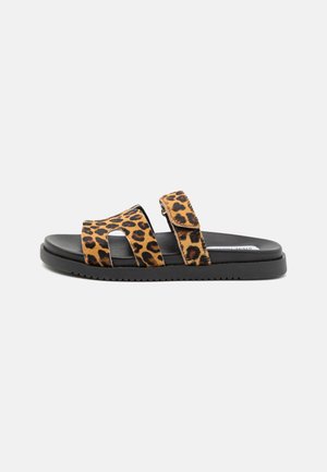 Leopard-print slide sandals with two wide straps, black rubber sole, flat design, and textured fabric for grip and comfort.