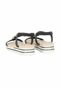 Sandali con cinturino intrecciato nero, parte superiore in materiale sintetico, soletta crema e suola a zeppa con strisce di glitter bianche e nere.