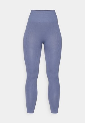 High-waisted ribbed leggings in soft blue fabric, featuring a smooth texture and fitted silhouette, extending to ankle length.
