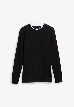 Schwarzes Langarm-T-Shirt aus Rippenstoff. Verfügt über einen Rundhalsausschnitt mit weißem Innenkragen und kontrastierenden schwarzen Bündchen.