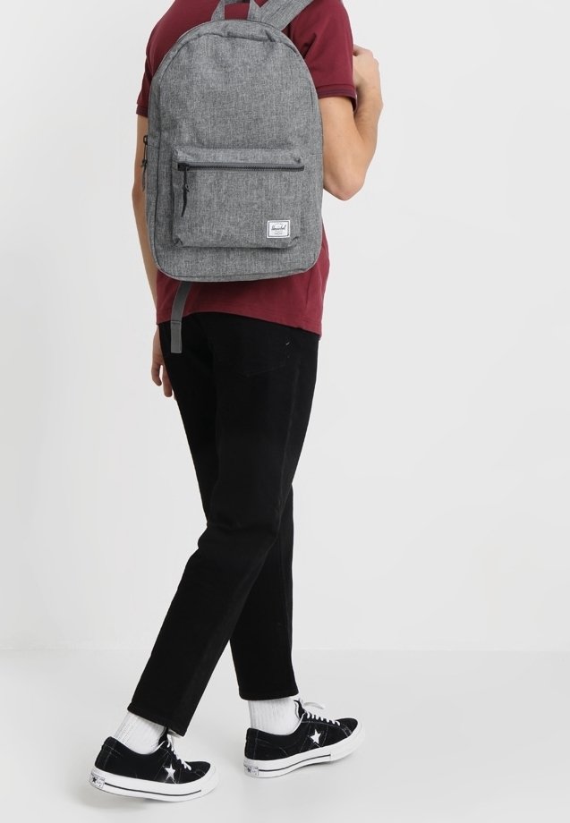 grey herschel backpack on a person Herschel Rucksack - mottled grey - (Pre-owned)