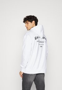 274 WORLD WIDE HOOD - Camisola - white