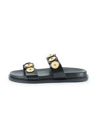 Sandal in pelle nera con tre accenti circolari dorati, dotato di suola piatta e cuciture lungo il bordo. Design semplice e aperto.