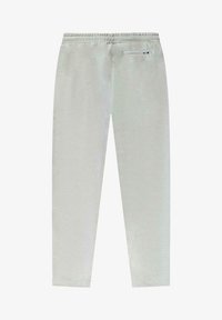 Lichtgrijze sweatpants met een elastische tailleband, taps toelopende pijpen en een achterzak met rits. Zachte stof met een gladde textuur.