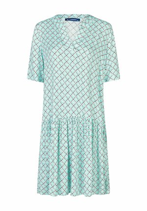 Robe ample à manches courtes avec motif en losanges turquoise et noir, col en V et jupe froncée.