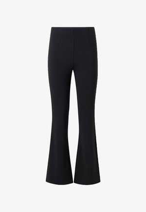 Pantalon taille haute noir pour femmes, ajusté avec une jambe évasée et des fentes latérales, présenté sur un fond blanc.