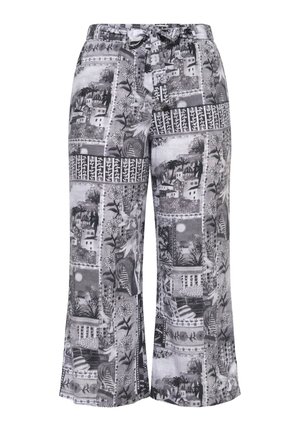 Wijde broek met trekkoord in de taille, met zwart-witte patchworkprint van huizen, planten en abstracte patronen.