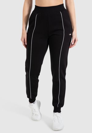 Pantalones deportivos - black