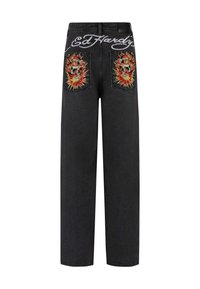Black denim jeans featuring embroidered skull designs with fiery accents on the back pockets. "Ed Hardy" logo embroidered above the waistband.