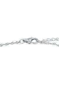 Collana d'argento con chiusura a molla, caratterizzata da un design attorcigliato e maglie lisce, che mette in evidenza la texture e la finitura del metallo lucido.