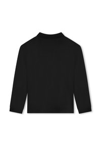 Polo-shirt noir à manches longues avec col plat, présentant un tissu texturé et des poignets côtelés. Vue de dos, sans motifs ni quincaillerie visibles.