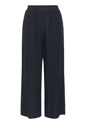 Platų kojų kelnės, pagamintos iš lengvos tamsiai mėlynos medžiagos. Jos turi elastinį diržą ir laisvą kirpimą, be matomų kišenių ar puošmenų.