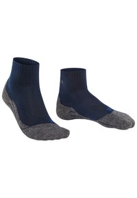 Calcetines tobilleros azul marino con parte superior acanalada y suela acolchada gris. Presentan punteras reforzadas y soporte para el arco para mayor comodidad.