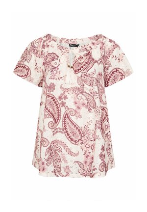 Biała bluzka z krótkim rękawem, z różowym nadrukiem w kwiatowy wzór paisley, z elastycznym dekoltem oraz wiązaniem z przodu ozdobionym frędzlami i koralikami.