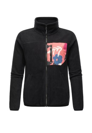 Veste en polaire noire avec col haut, fermeture éclair à l'avant, et une poche en patch rose ornée de motifs floraux bleus et blancs. Deux poches latérales.