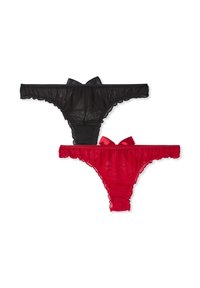 Perizoma in pizzo trasparente nero e rosso con bordi arricciati e fiocchi di raso sul retro. Ogni pezzo presenta una texture delicata e leggera.