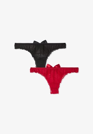 Perizoma in pizzo trasparente nero e rosso con bordi arricciati e fiocchi di raso sul retro. Ogni pezzo presenta una texture delicata e leggera.