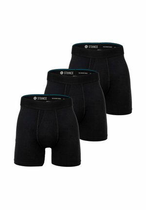 Schwarze Boxerbriefs im Dreierpack, bestehend aus glattem Stoff, einem Bund mit dem "STANCE"-Logo und einer figurbetonten Silhouette.