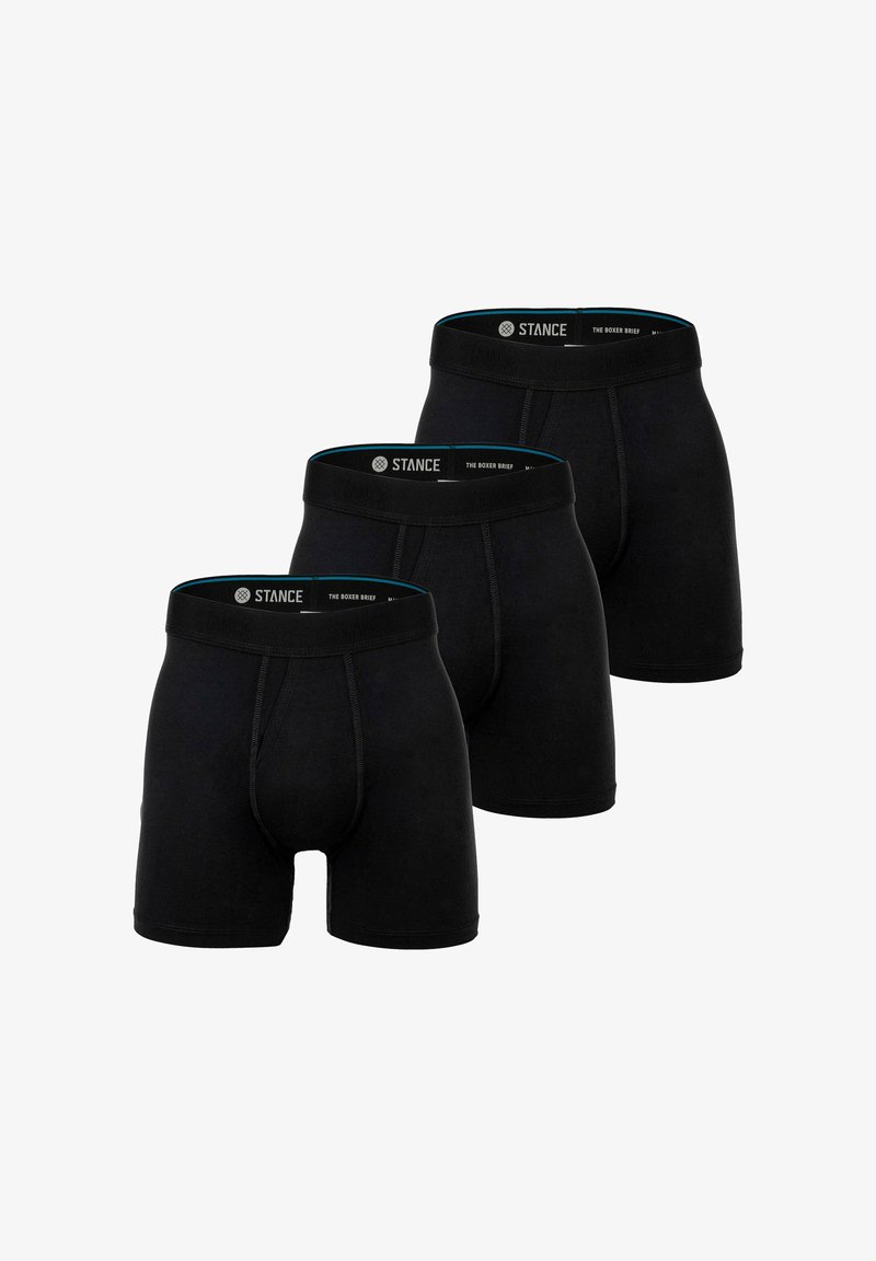 Black boxer briefs in a pack of three, featuring a smooth fabric, a waistband with the "STANCE" logo, and a fitted silhouette.
