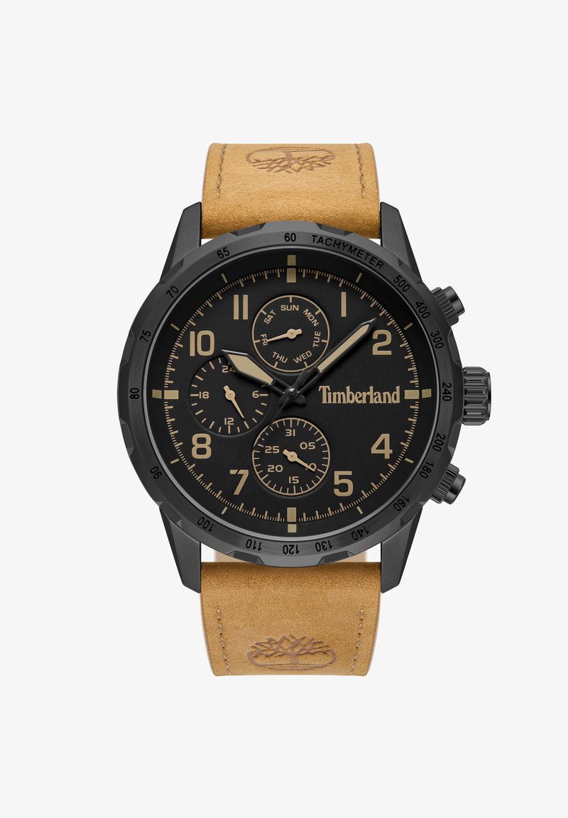 Melna analoga pulksteņa ar strukturētu brūnu ādas siksnu. Iekļauj melnu ciparnīcu, zeltītus akcentus, takimetru un trīs subciparnīcas datuma un laika rādīšanai.