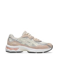 Beige and light pink ASICS running shoe with mesh and suede upper, white cushioned midsole, and black rubber outsole, shown from the side.