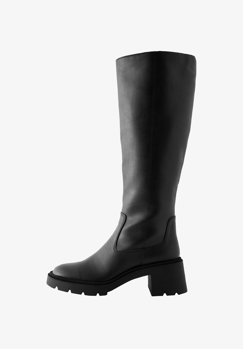 Black leather knee-high boot with a chunky block heel, elastic side panel, and a smooth texture. Features a rounded toe and rugged sole.