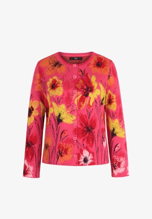 Strikket cardigan i klar pink med blomsterprint i gul, rød og sort. Har lange ærmer og fem pink knapper foran.