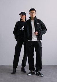 MARINE SERRE SPORT TRACK PANTS UNISEX - Παντελόνι φόρμας - black